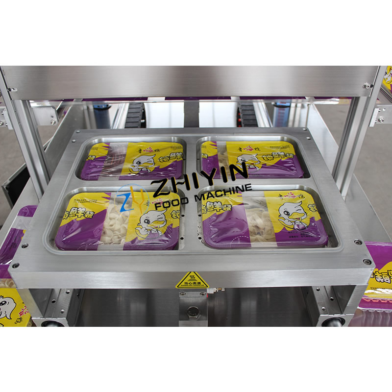 Automatic film sealing box packing machine